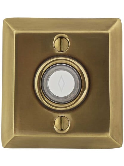 Doorbell Button with Quincy Rosette in Antique Brass.